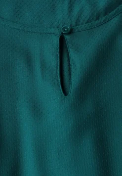 Blouse en couleur unie
