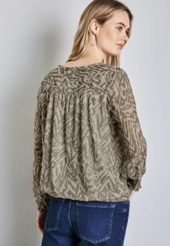 Blouse en mousseline de soie avec fronces