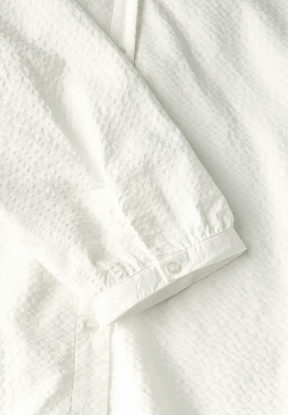 Blouse en seersucker à col fendu
