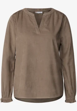 Blouse en velours côtelé avec détails à volants