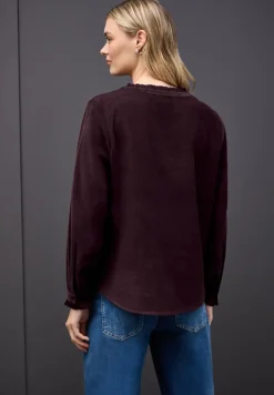 Blouse en velours côtelé avec volants