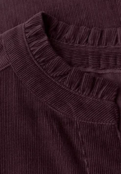 Blouse en velours côtelé avec volants