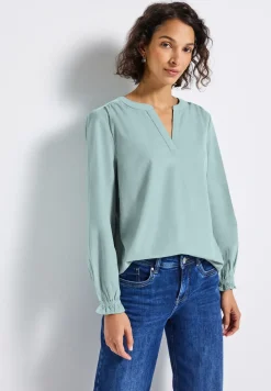 Blouse en velours côtelé avec détails à volants