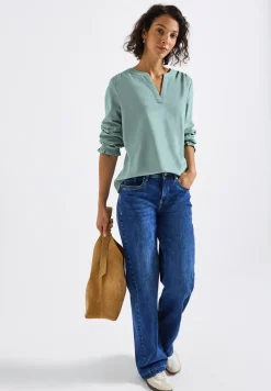 Blouse en velours côtelé avec détails à volants