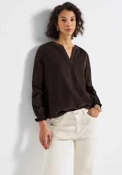 Blouse en velours côtelé avec détails à volants