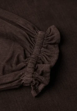 Blouse en velours côtelé avec détails à volants