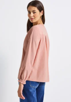 Blouse en velours côtelé avec détails à volants