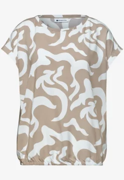 Blouse imprimée à épaules tombantes