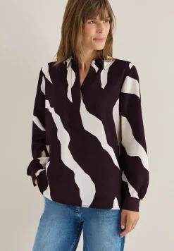 Blouse imprimée avec bordures en ruban