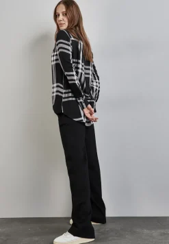 Blouse longue à carreaux
