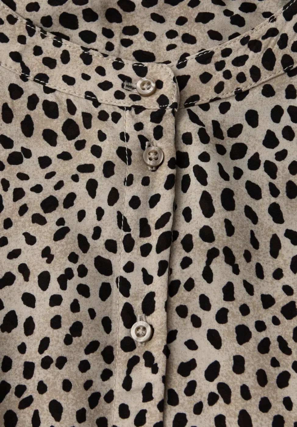 Blouse léopard avec détails en bande