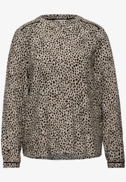 Blouse léopard avec détails en bande