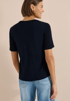 Blouse manches courtes à col fendu et rubans