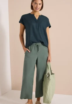 Blouse manches courtes à col fendu