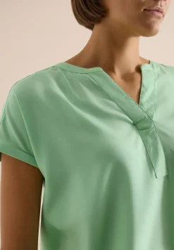 Blouse manches courtes à col fendu