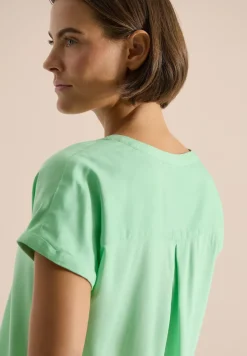 Blouse manches courtes à col fendu