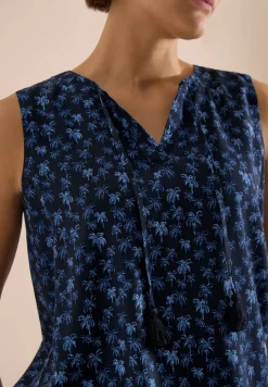 Blouse sans manches à col fendu et imprimé palmiers