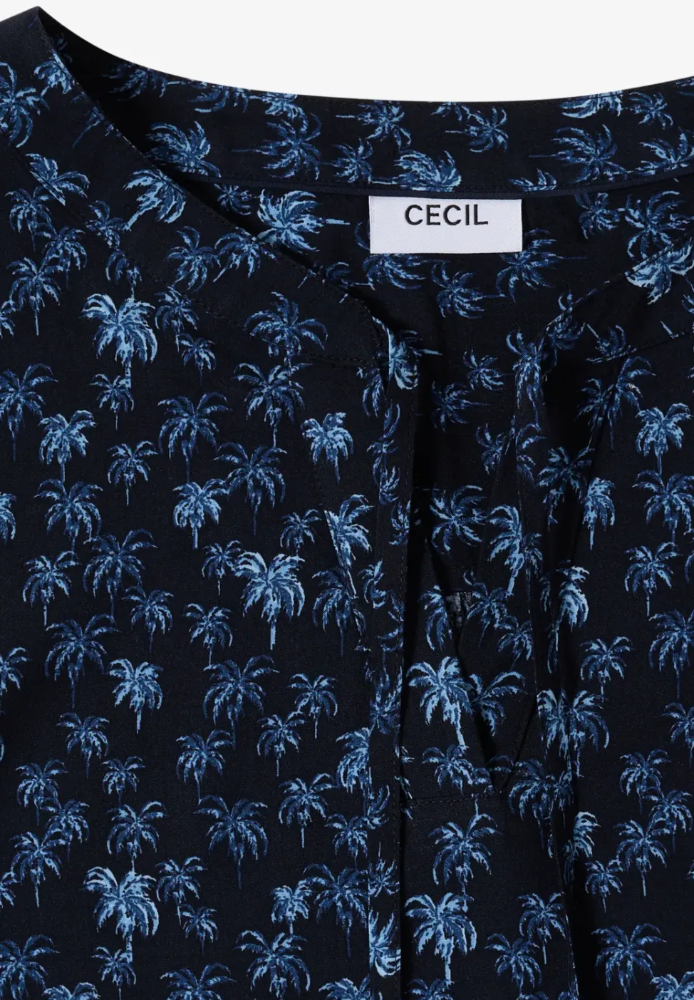 Blouse sans manches à col fendu et imprimé palmiers