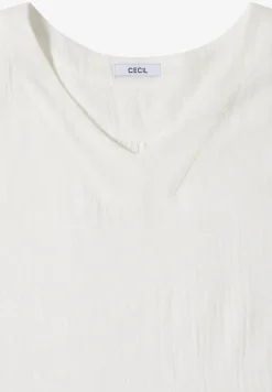 Blouse sans manches col V en mousseline