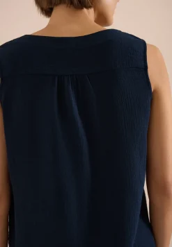 Blouse sans manches col V en mousseline