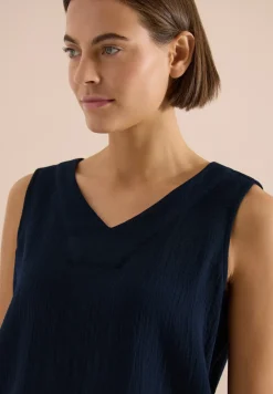 Blouse sans manches col V en mousseline