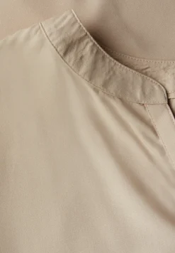 Blouse split neck en couleur unie