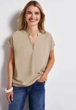 Blouse split neck en couleur unie