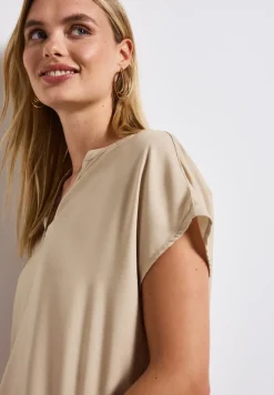 Blouse split neck en couleur unie