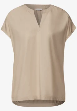 Blouse split neck en couleur unie