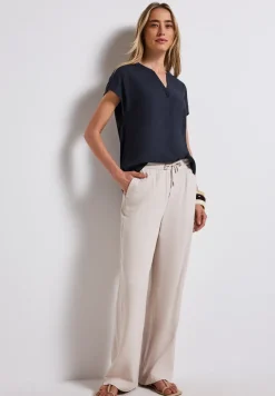 Blouse split neck en couleur unie