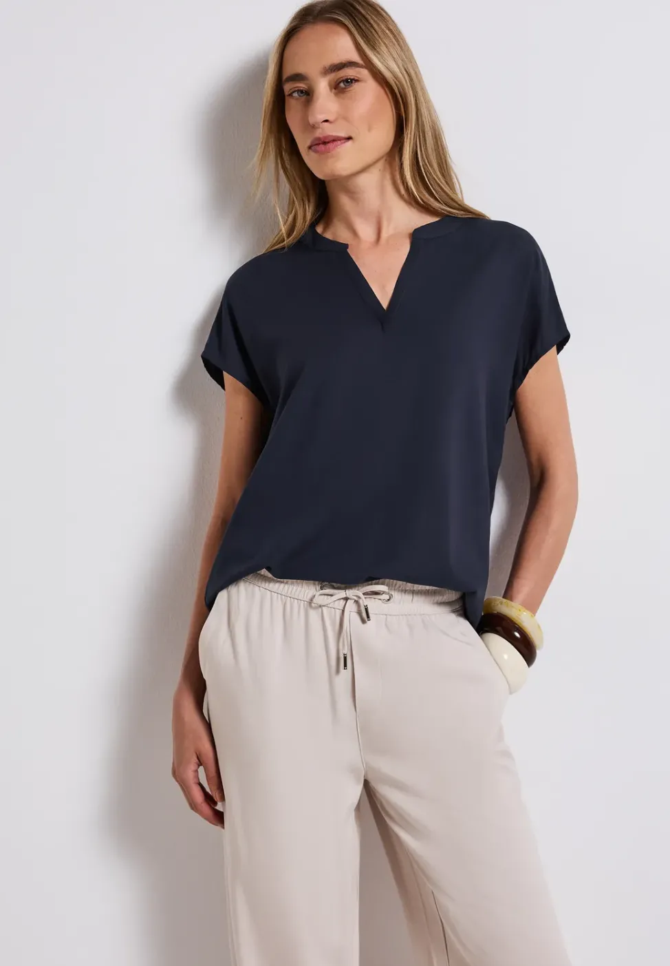 Blouse split neck en couleur unie