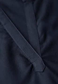 Blouse split neck en couleur unie