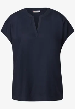 Blouse split neck en couleur unie