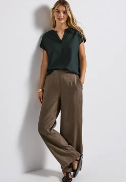 Blouse split neck en couleur unie