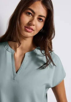 Blouse split neck en couleur unie