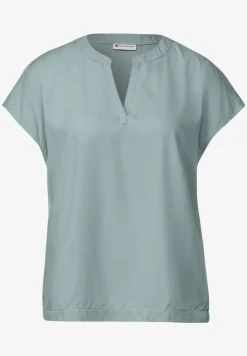 Blouse split neck en couleur unie