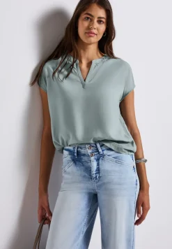 Blouse split neck en couleur unie