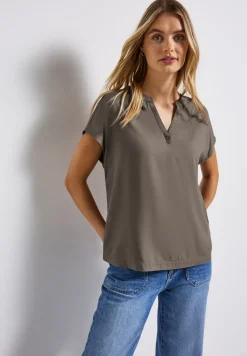 Blouse split neck en couleur unie