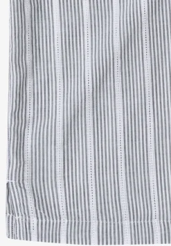 Blouse structurée à épaules tombantes