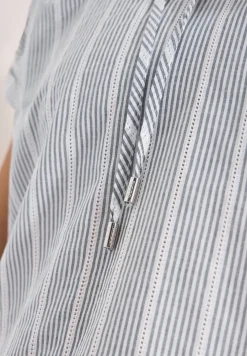 Blouse structurée à épaules tombantes