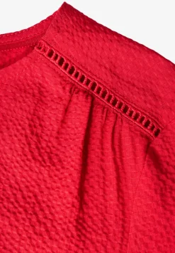 Blouse structurée avec broderie