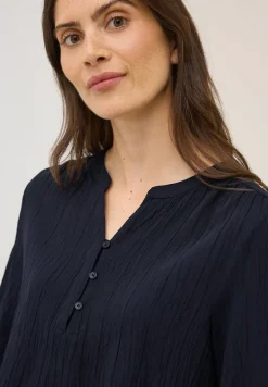 Blouse structurée en couleur unie