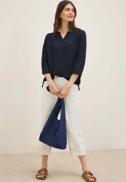 Blouse structurée en couleur unie