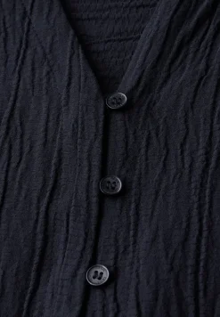 Blouse structurée en couleur unie