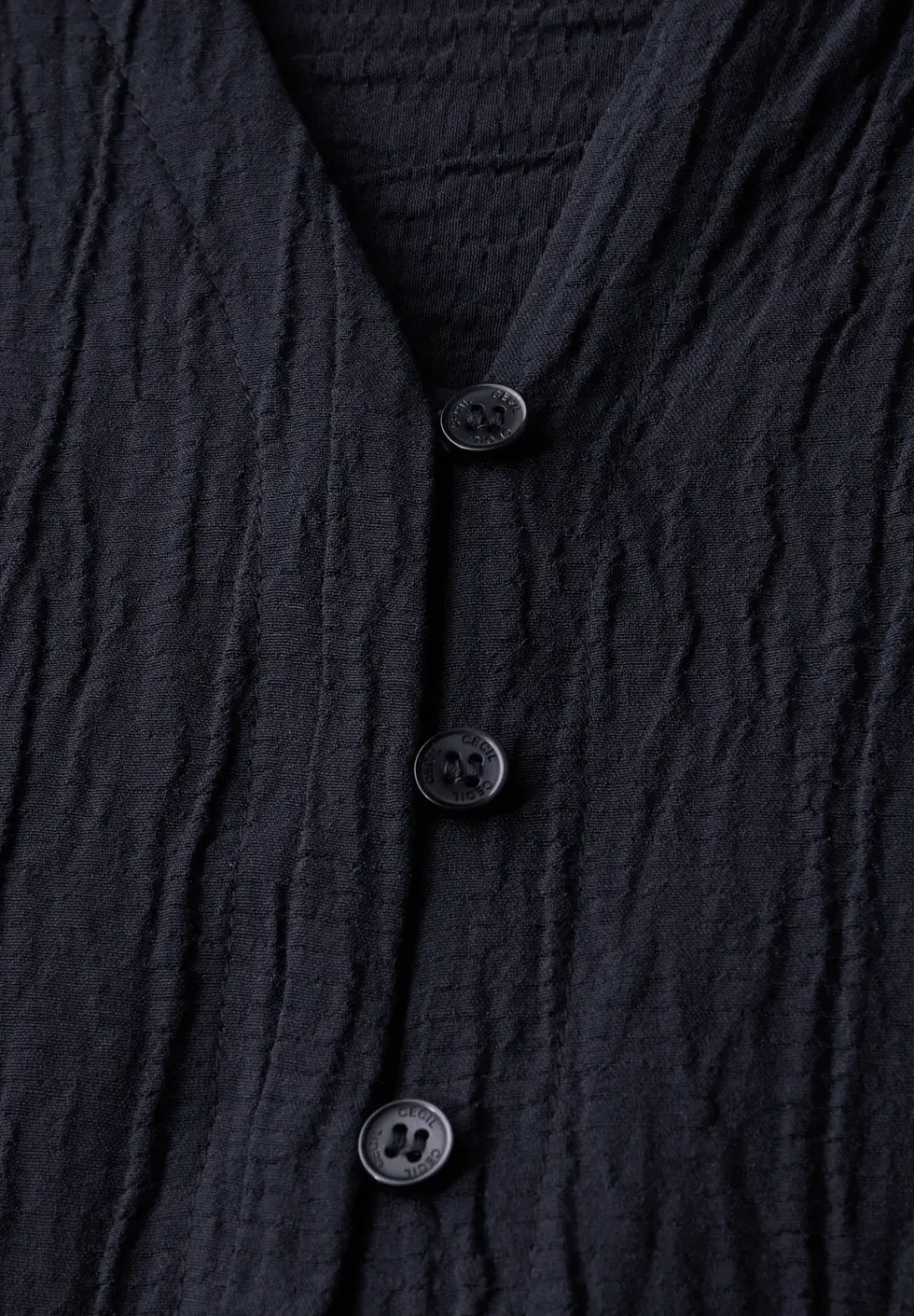 Blouse structurée en couleur unie