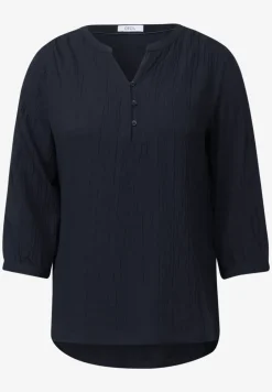 Blouse structurée en couleur unie