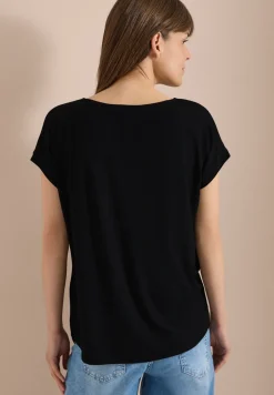 Blouse avec col rond et détail de nœuds