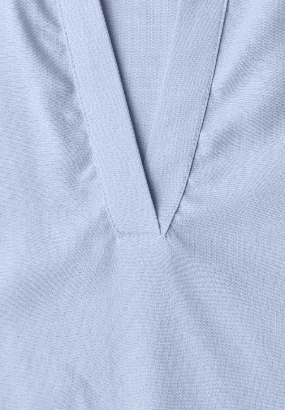 Blouse à col chemise et ourlet élastiqué
