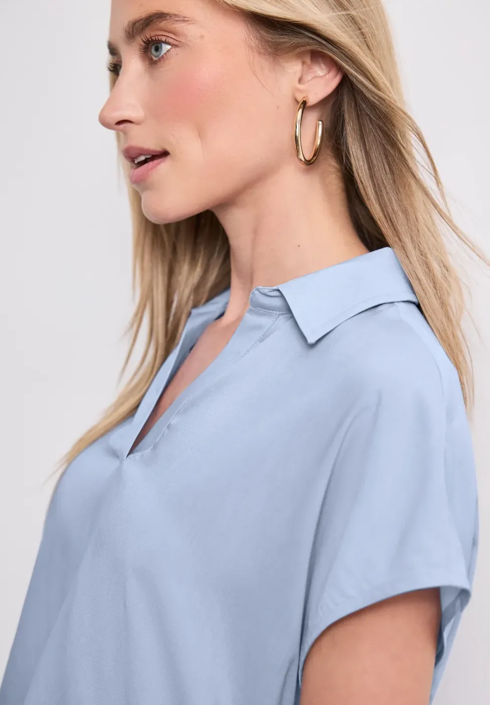 Blouse à col chemise et ourlet élastiqué
