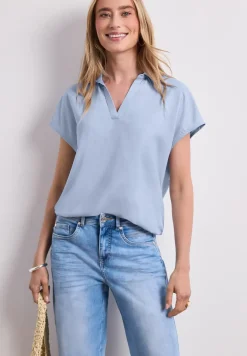 Blouse à col chemise et ourlet élastiqué